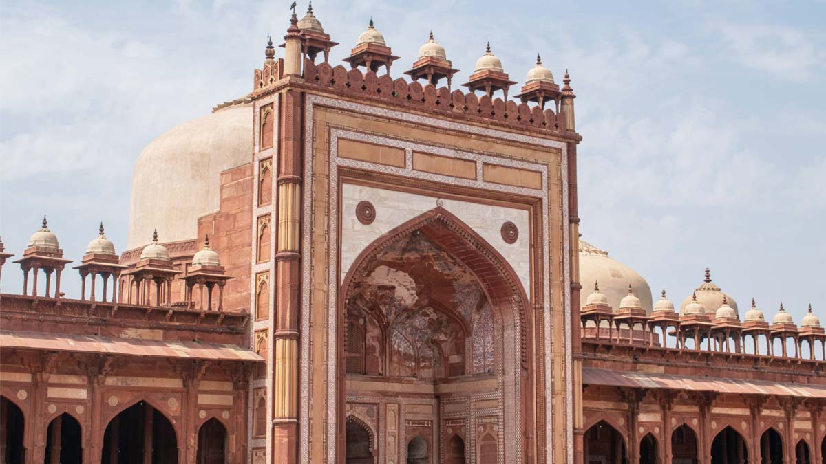 a large building with a dome and a roof that is Fatehpur Sikri