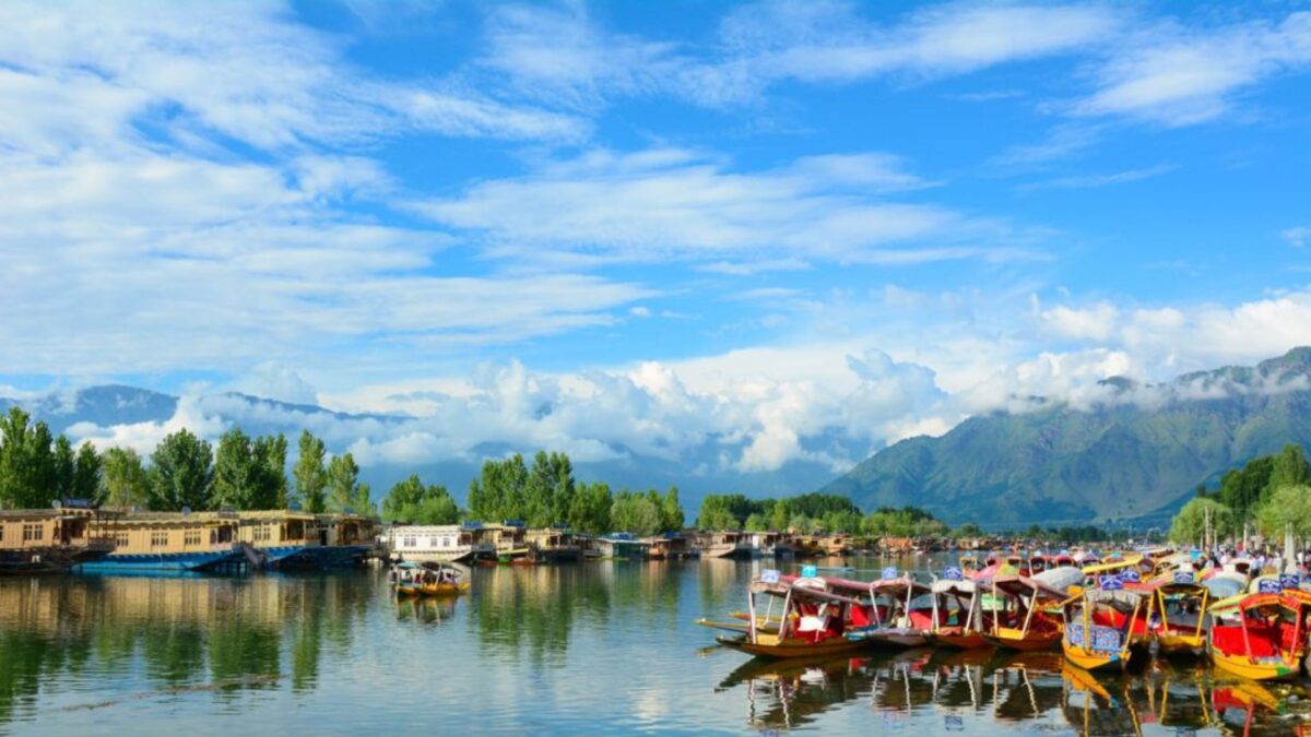 river, mountain and beautiful sky with many boats in Srinagar